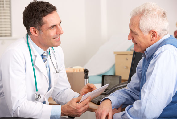 Doctor Talking to an Elderly Man